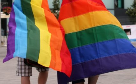 Pride march with rainbow flags